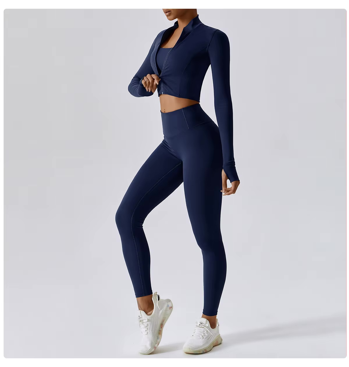 Ensemble de sport pour femme trois pièces avec gilet, haut et pantalon