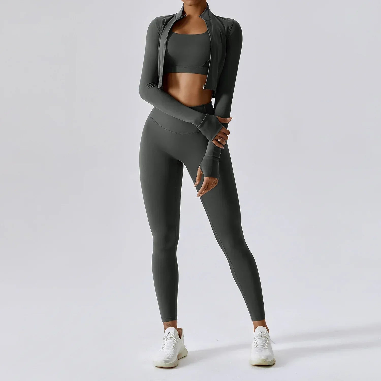 Ensemble de sport pour femme trois pièces avec gilet, haut et pantalon