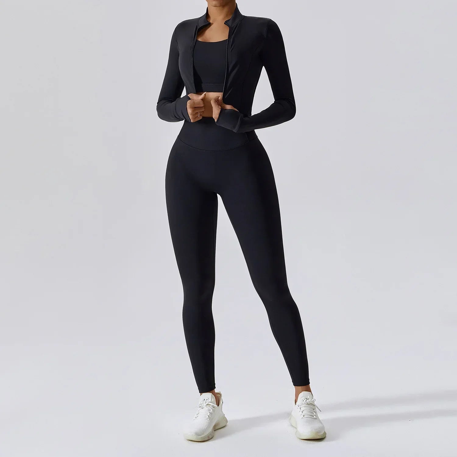 Ensemble de sport pour femme trois pièces avec gilet, haut et pantalon