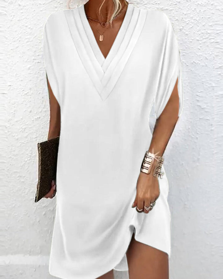 Robe élégante à manches fendues de couleur unie