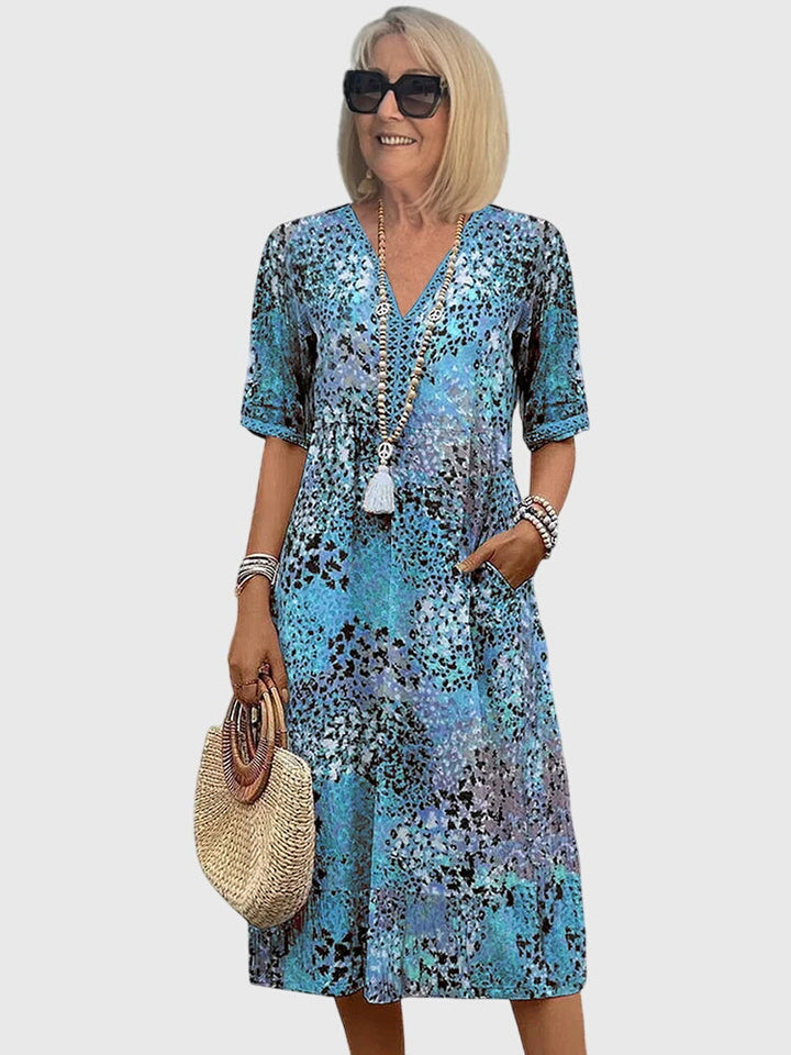 Bella | Robe Midi Fleurs Élégante