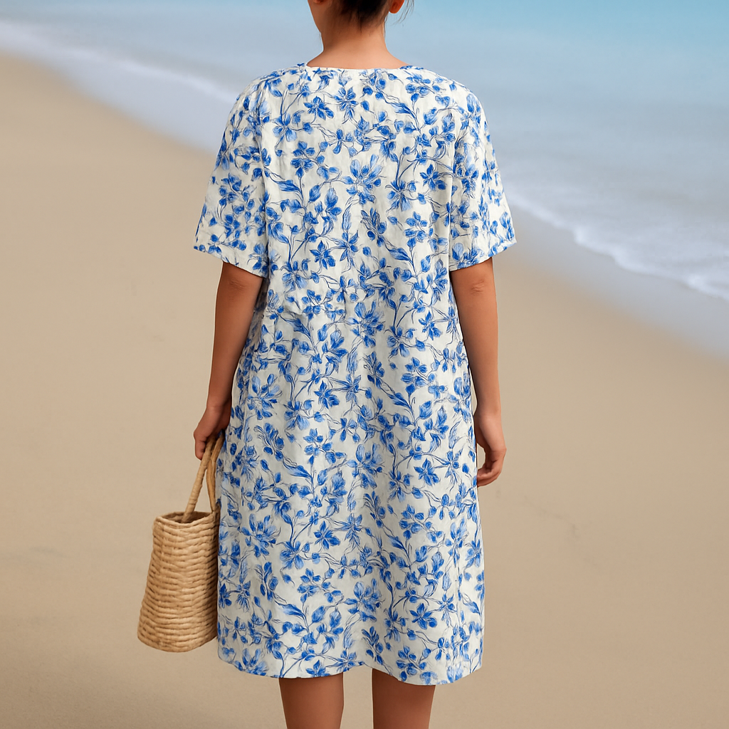Léonie | Robe couleur ivoire avec des fleurs en porcelaine bleue