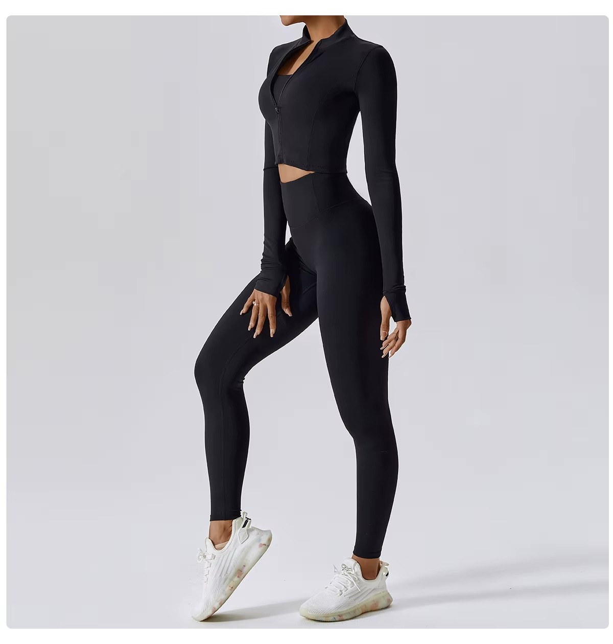 Ensemble de sport pour femme trois pièces avec gilet, haut et pantalon