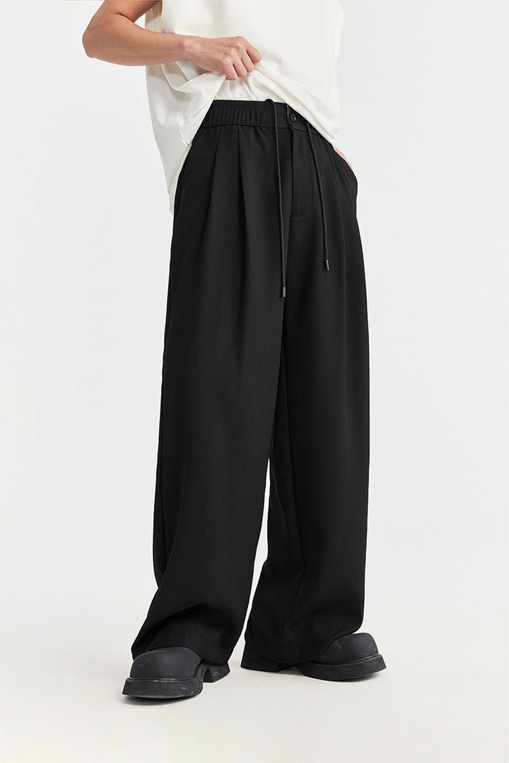 Pantalon palazzo en lin pour homme | Jambes larges, plis et cordon de serrage 1