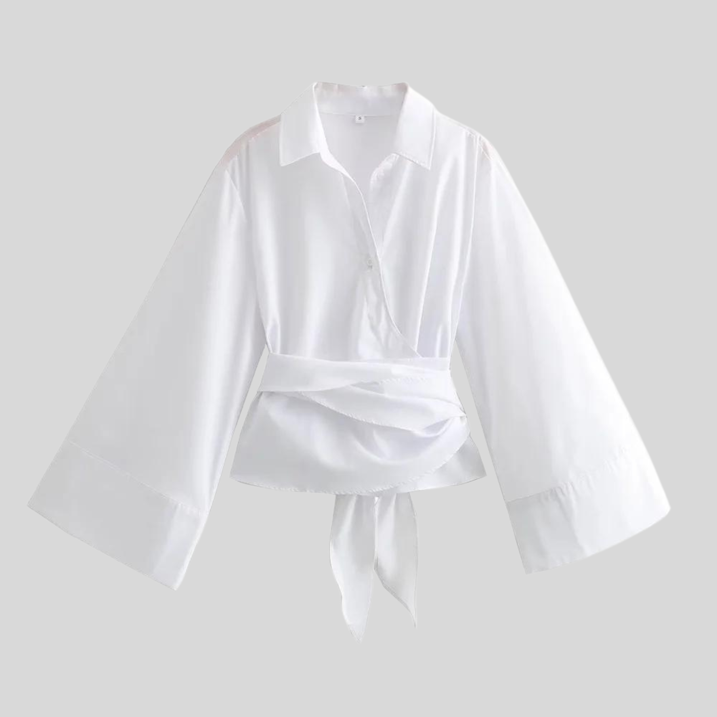 Haut femme élégant coupe fluide col croisé usage quotidien